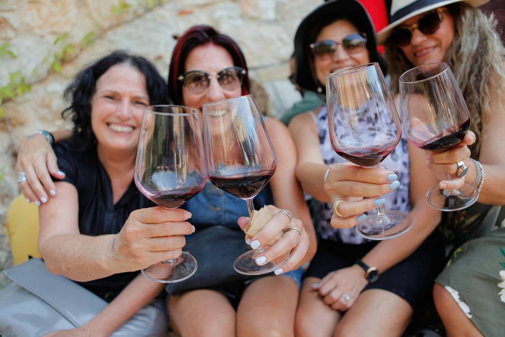 Four Women Drinking Wine at Amphorae Winery in Zikhron Yaakov